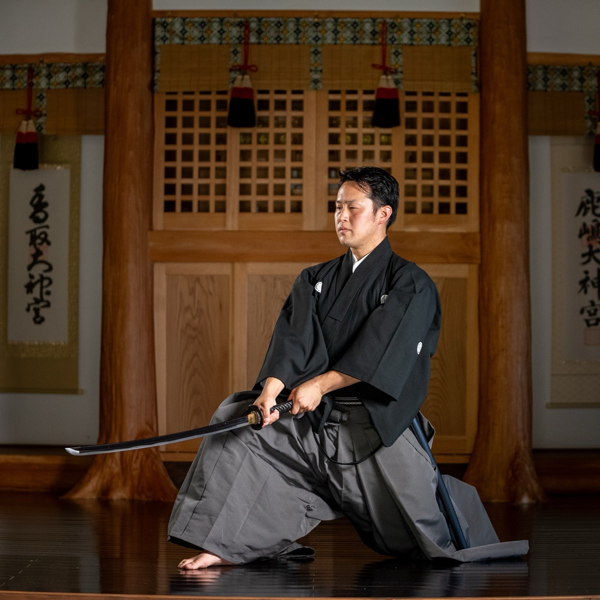 Iaido sword drawing practice in traditional setting